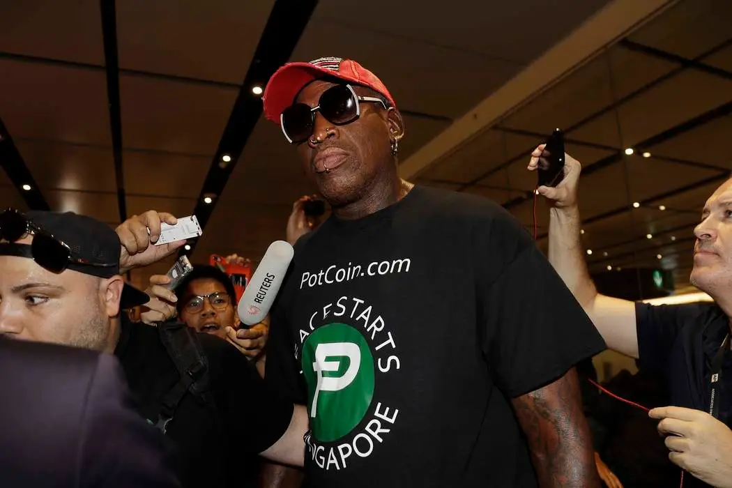 Dennis Rodman after landing in Guam